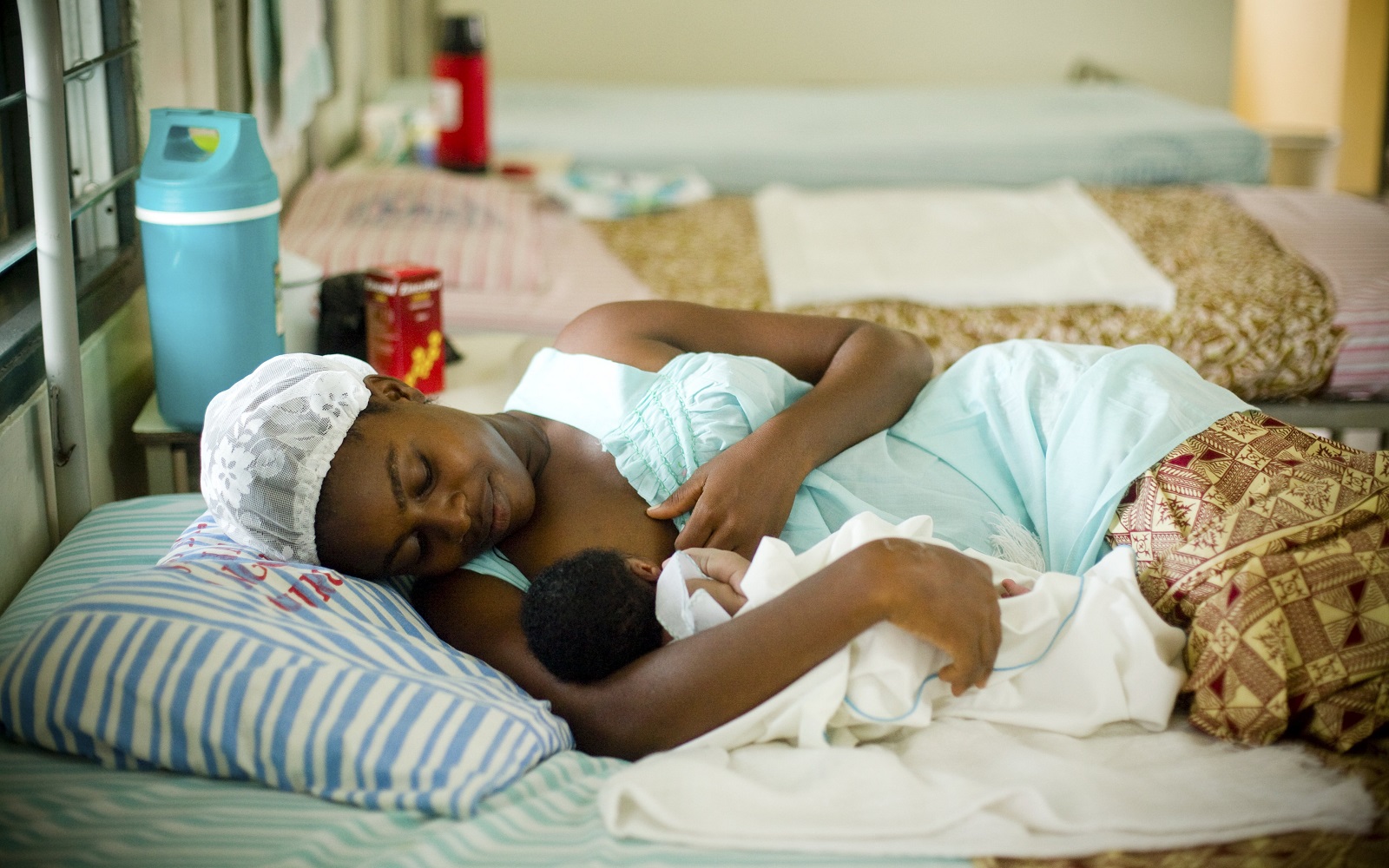 Rebecca Martey breastfeeds her newborn son, Gerald, at Osu Maternity Home in Accra, Ghana.